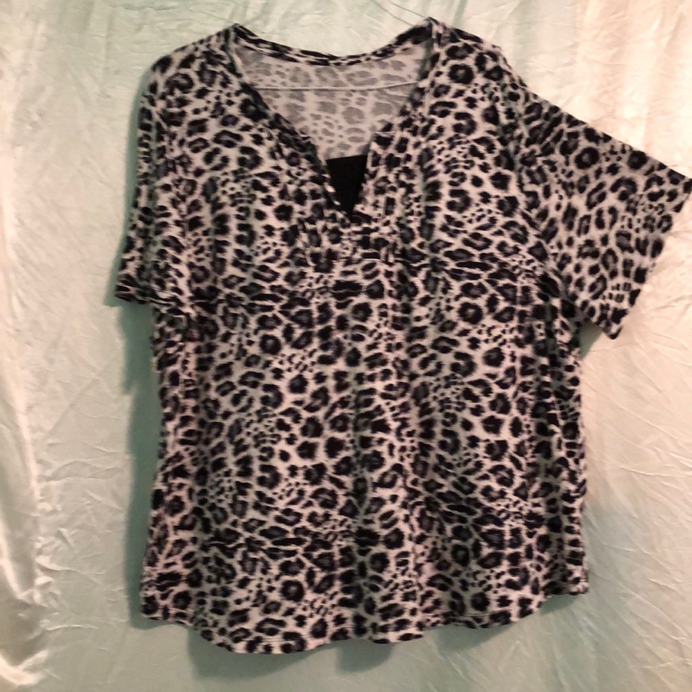 White Stag. Short sleeves T-shirt.  Black,white, and gray